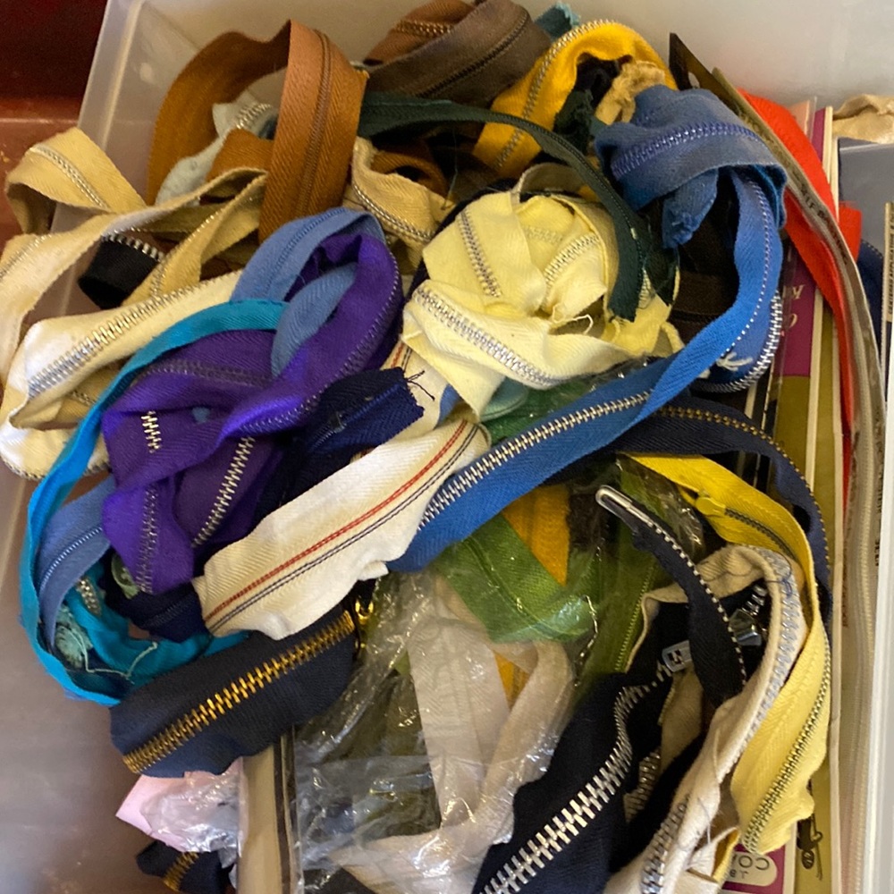 Bin of zippers